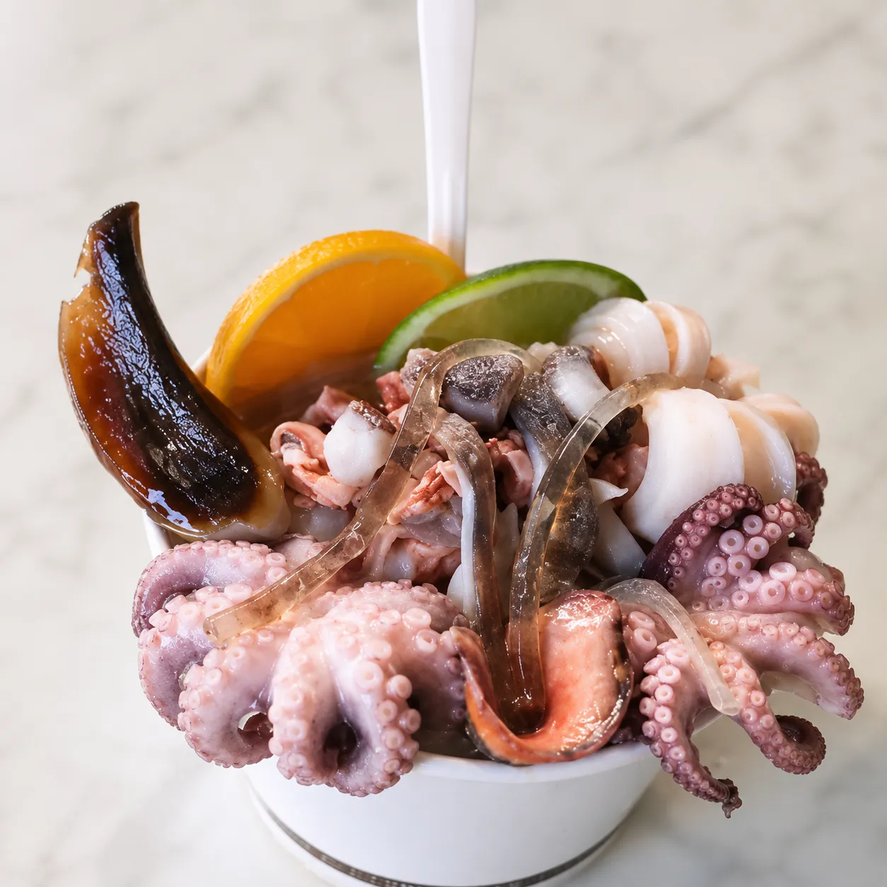 Octopus salad with island citrus, tomato and sweet pepper