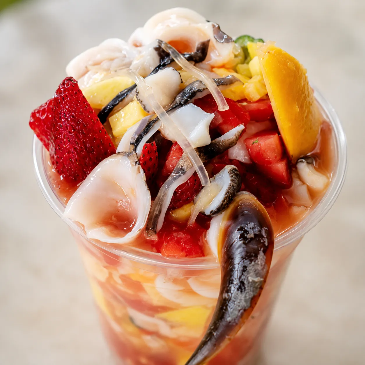 Tropical conch salad with mango and pineapple